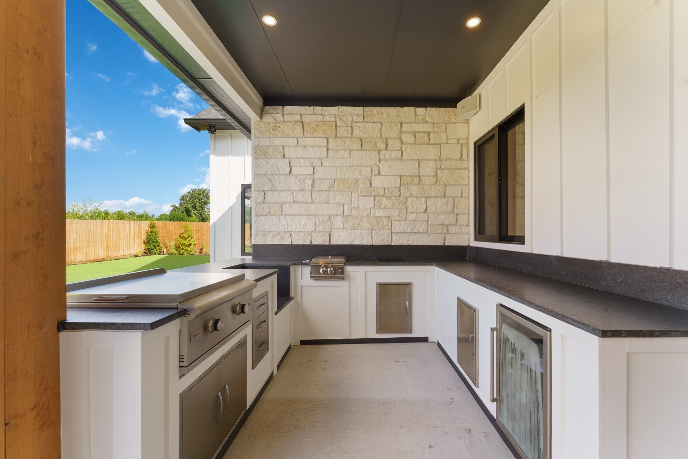 Outdoor kitchen and living area